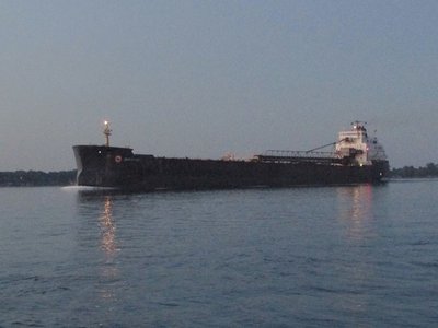 Darkness was giving way to the faintest early light when John B. Aird appeared, up-bound to Superior.
