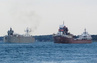 2016-07-13f Defiance & LAT.jpg (96.34 KiB) Viewed 1764 times Down-bound Lee A. Tregurtha (an older, classic freighter) meets up-bound tug-barge Defiance/Ashtabula (one of the newer designs).
