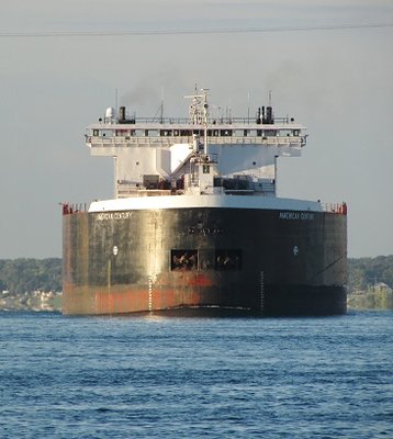Morning sun reflects off the bow of American Century.  She unloaded coal at the St. Clair Power Plant and was headed back to Superior.