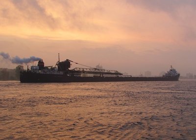 A veil of fog still covered the rising sun as Lee A. Tregurtha sailed on to the AK Rouge Plant.