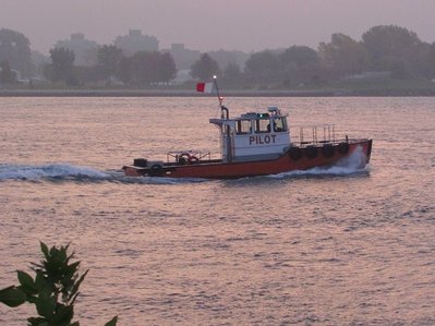 Under brightening skies, either Huron Belle or Huron Maid was returning from a run out on the lake.