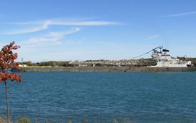 Blue skies, blue water, and autumn colors were part of Calumet's day as she made her way to Chicago.