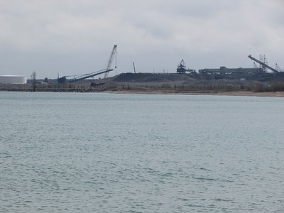 2017-04-15c.jpg (114.98 KiB) Viewed 2385 times My view of LAT from the city park. Her stack and boom are just ahead of the white storage tank.