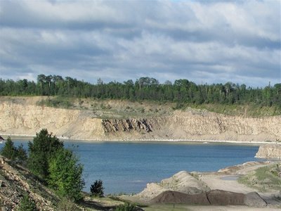 Small lake in gravel pit, as seen from the bridge on Business Route 23.