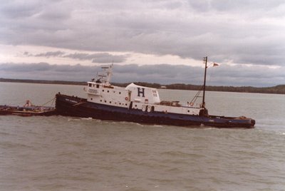 Tug Mary E. Hannah and barge upbound in the St. Mary's River.