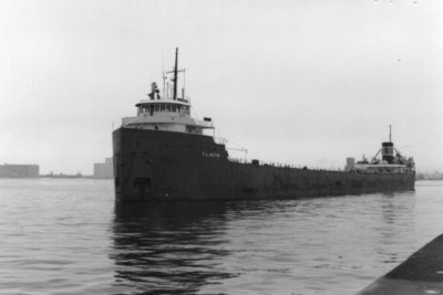 Outbound Duluth with tug Malcolm.