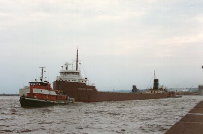 "G" tug Ohio outbound Duluth with Alastair Guthrie in tow. "G" tug Rhode Island on the stern. Loaded at Capitol #6 elevator, Duluth heading for Buffalo.