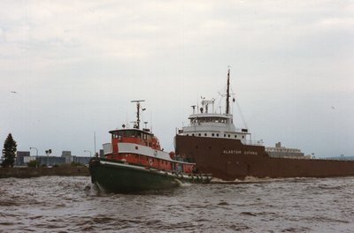 "G" tug Ohio on the bow of the Alastair Guthrie.