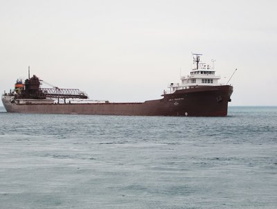 By the time Lee A. Tregurtha came off Lake Huron (17:28) sporting her fresh coat of paint and loaded for the Rouge, blue skies had been replaced with a thick, gray blanket of clouds.