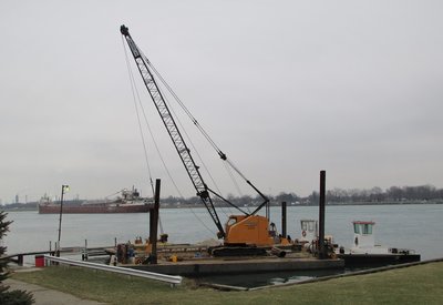 Work crane, barge, and tugs (with Philip R. Clark in the background) at Marysville.