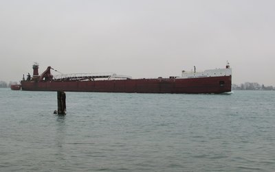 Tug Joseph H. Thompson and barge Joseph H. Thompson, Jr. (Conneaut) moving through drizzle and mist at Marine City.
