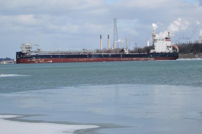 Algoma Innovator doing a mid-river pirouette to back down to the fuel dock.