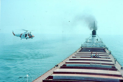 Rescue of Crewman Trader 1981_edited.jpg (87.84 KiB) Viewed 4952 times The USCG Chopper nearing the open hatch.