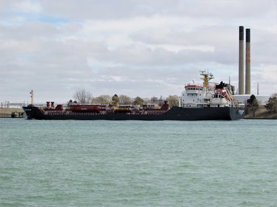 Algocanada passing the moored Iver Bright on her way to the lower Lake Huron anchorage.