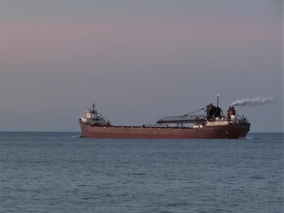 Soft twilight colors paint the sky as Lee A. Tregurtha (Two Harbors) enters Lake Huron.