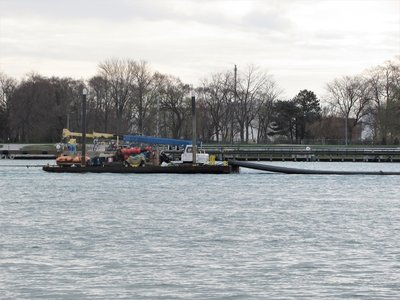 Equipment barge. Following this barge was an exceptionally long "tail" with what appeared to be a light (for night travel?).