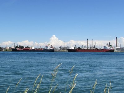Fascinating cloud formations billow behind Algonova and Sloman Hermes, at the lower Sarnia Fuel Dock.