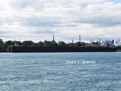 Walter J. McCarthy refueling at the Corunna dock before resuming a trip to Superior.
