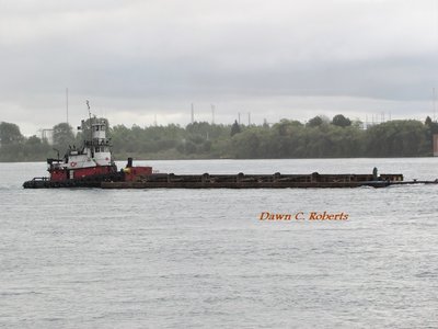 Tug Thomas Morrish has been dredging areas of the St. Clair River. They've been moored at Marysville since sometime in the afternoon.