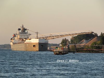 The sun was barely up but Manitowoc had about finished discharging her load at the Bluewater Aggregates facility in Marysville.
