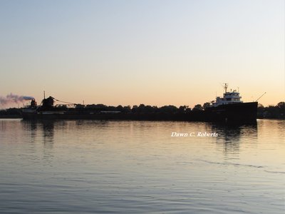Early morning light, and Lee A. Tregurtha (Toledo) is reflected in the water.
