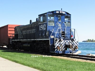While waiting for ship traffic to begin, this engine, with a small consist was working the tracks along the river. (For you Boatnerds who are also rail fans!)