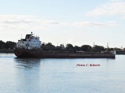 Clouds are moving out as Atlantic Huron (Sydney, N.S.) approaches the Marysville boat launch.