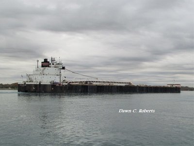 John J. Boland (Ashtabula) stands out against shades of gray and white in sky and water.