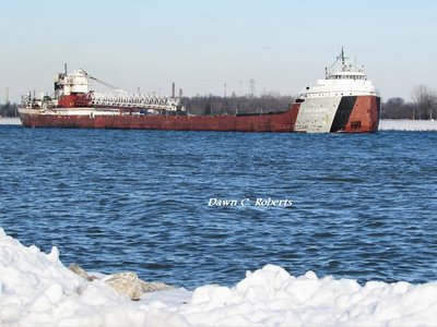Philip R. Clarke (Detroit) passes a snow pile at Marysville's Junction Buoy.