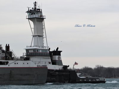 Hard-working tug Victory.