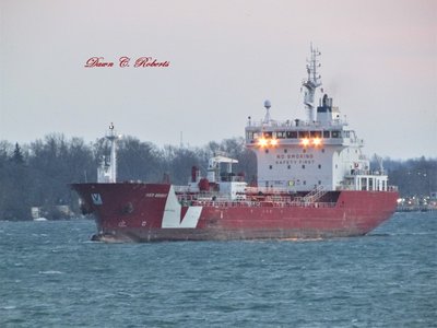 Iver Bright approaching the lower Sarnia Fuel Dock at dusk.