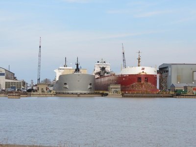 Kaministiqua on the left along with Rt. Hon. Paul J. Martin at Heddle Port Weller, Ontario Dry dock.