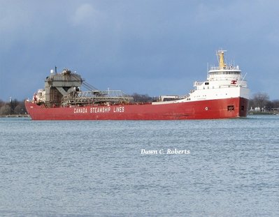Frontenac (Port Colborne) leaving one of the many rain/snow squalls of the afternoon behind.