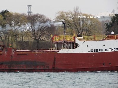 Don't recall seeing this exhaust pipe before, but it was leaving quite a trailing plume. (Can you spot the crew member in a red hat on deck?)