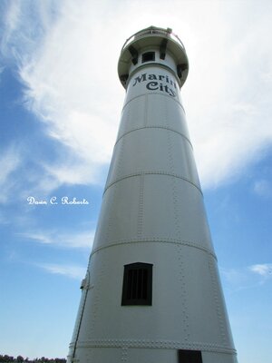 Built in 1908 on Peche Island. In the 1980s it was about to collapse, so the Coast Guard replaced it and brought the old tower to shore. Now the centerpiece of the Marine City waterfront, it still retains its (inactive) 6th order Fresnel lens.