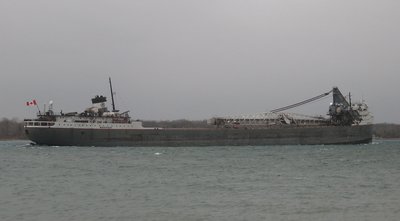 Making her way through choppy water and whitecaps
