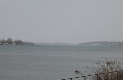 Looking down river through a snow squall