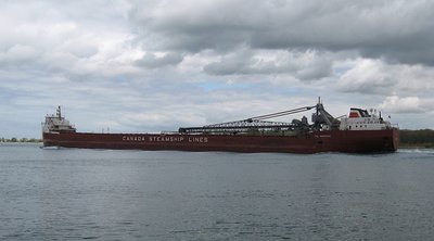 In ballast to Duluth.  (Note how the water rides in waves the length of her sides.)