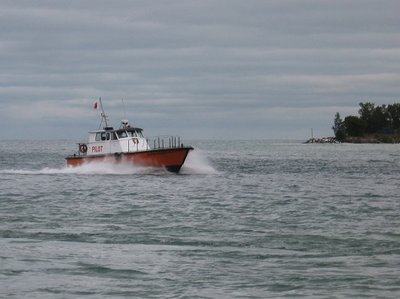 After making a pilot change, the supply boat speeds back to her Port Huron Dock