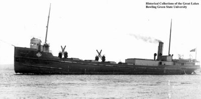 Note crew Doghouse (with windows) on the stern cabins. ahead of the stack.