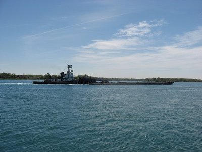 Pushing its barge to Hamilton
