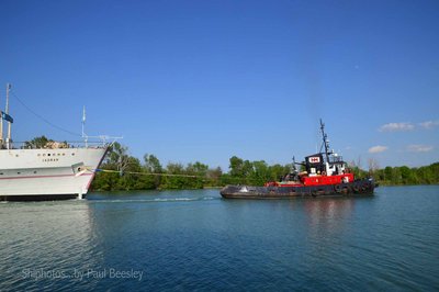 Tow line passes up the Hawse Pipes and is secured on deck.