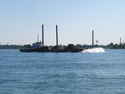 Here comes Manitou smashing through Bluebill's wake!