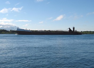 Joseph H. Thompson &amp; Joe, Jr. slowing for Blue Water Aggregates, at Marysville.