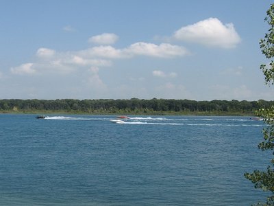 Watercraft of all designs and speeds were on the river.  This group of four speed boats lead at least a dozen more up river -- and they all seemed unaware of the speed restrictions.