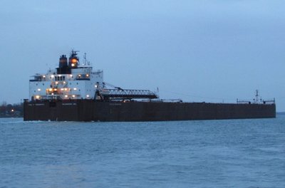 2015-10-24a PRT.jpg (83.73 KiB) Viewed 1560 times Stern lighting helped but it was almost too dark to get a good image of "Big Paul" loaded with coal for the power plant.