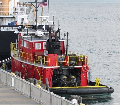 This is the kind of tugboat I knew as a child.  A toot on the whistle would have really been nice!