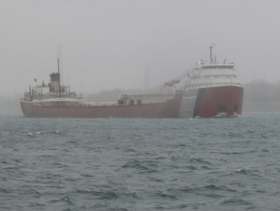 John G. Munson loaded with stone and downbound to Huron, OH.