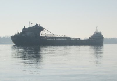 ...and disappearing into the mist as she moves down river to Toledo.