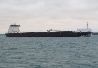 Skies were beginning to brighten a bit when the Algoma Equinox passed on her way to Port Cartier.